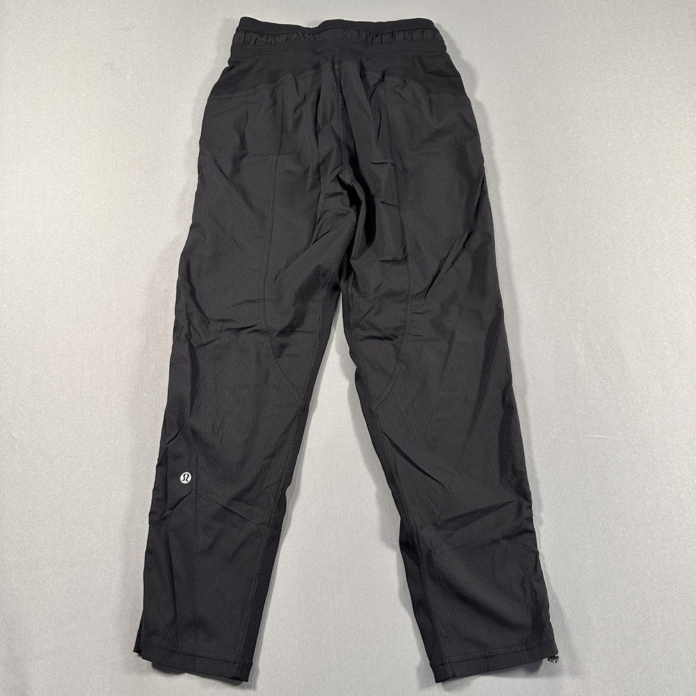 Lululemon Track Pants Womens 2 Black High Rise Lightweight Zip Hem Athletic Gym - Picture 9 of 9